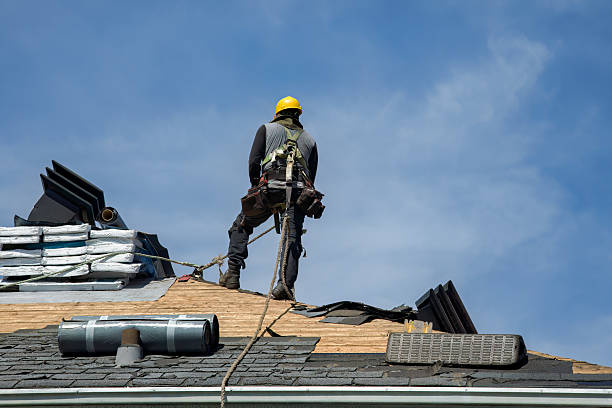 Professional Roof Replacement technician working in Ocean Beach, NY